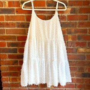 white mini babydoll dress with tassels